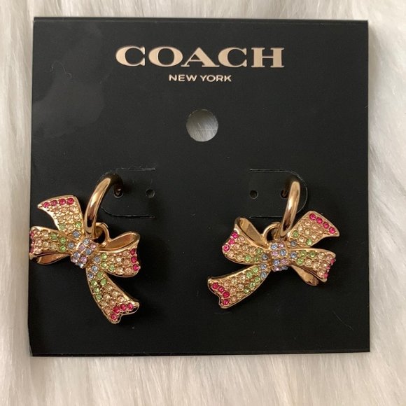 COACH Pave Bow Huggies Earrings in Gold - Picture 1 of 2